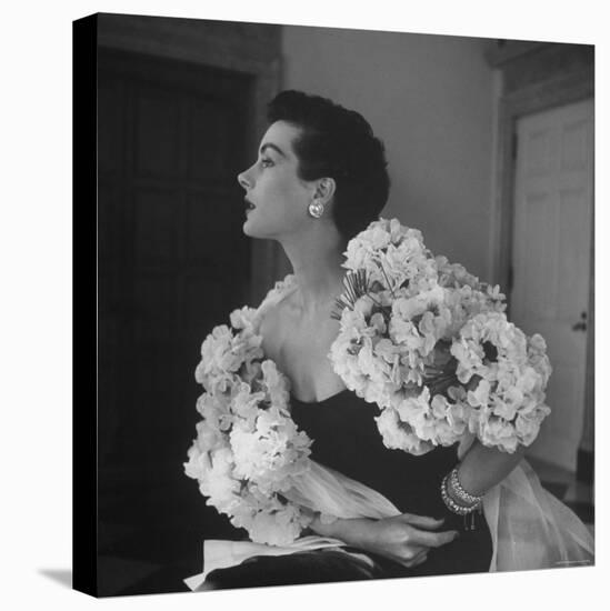 Model Wearing a Flowery Dress While Peering Into the Distance-Nina Leen-Premier Image Canvas