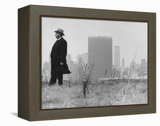 Realtor William J. Zeckendorf, Standing in the Wind Fields Located on the Outskirts of the City-John Loengard-Framed Premier Image Canvas