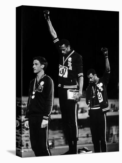 African American Track Star Tommie Smith, John Carlos After Winning Gold and Bronze Olympic Medal-John Dominis-Premier Image Canvas