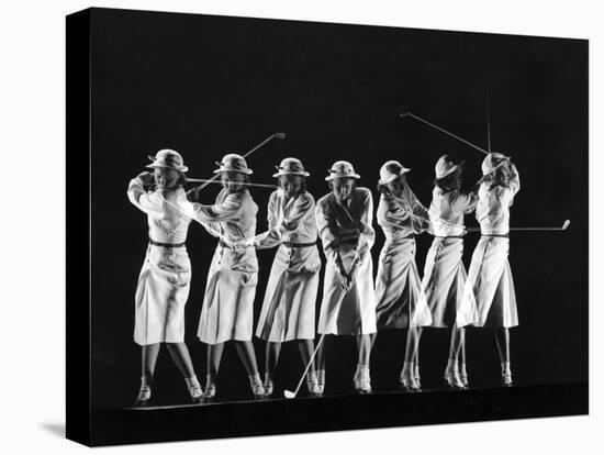 Saks Fifth Avenue Fashion Shot of Model Swinging Golf Club-Gjon Mili-Premier Image Canvas