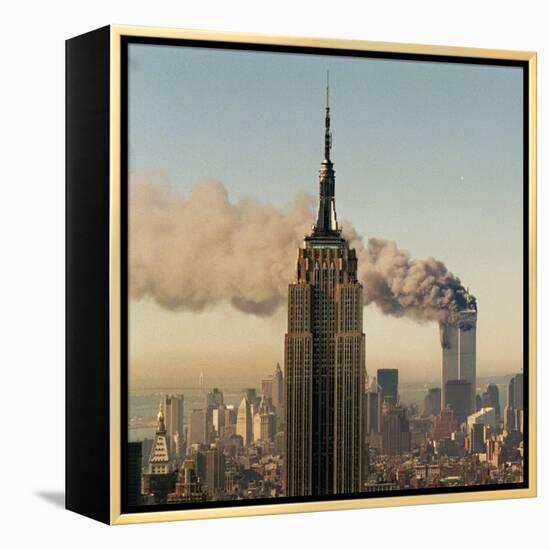 Twin Towers of the World Trade Center Burn Behind the Empire State Buildiing, September 11, 2001-null-Framed Premier Image Canvas