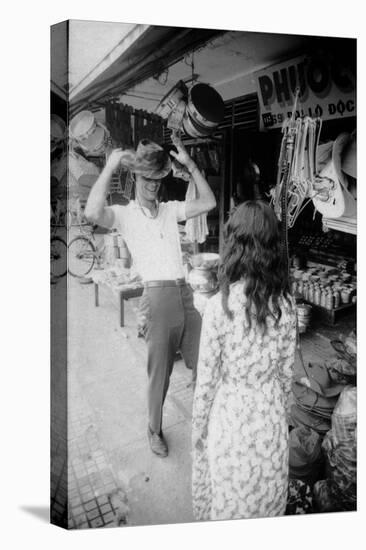 U.S Cpl. James C. Farley of Yankee Papa 13 Trying on Bush Hats, Danang, Vietnam 1965-Larry Burrows-Premier Image Canvas