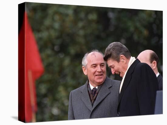 U.S. President Ronald Reagan, Right, Talks with Soviet Leader Mikhail Gorbachev-null-Premier Image Canvas