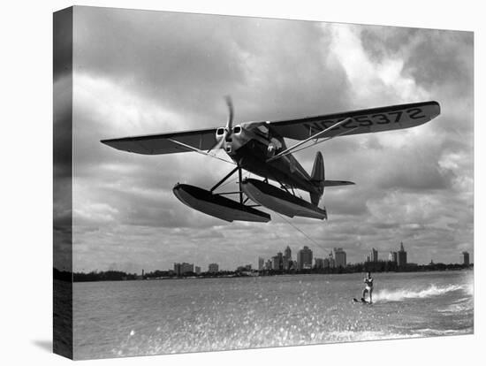 U.S. Water Ski Champion Bruce Parker Being Towed by a Seaplane across Biscayne Bay, 1946-null-Premier Image Canvas