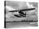 U.S. Water Ski Champion Bruce Parker Being Towed by a Seaplane across Biscayne Bay, 1946-null-Premier Image Canvas