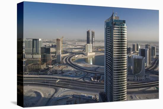 UAE, Downtown Dubai. Edge of Downtown area towards Ras Al Khor-Walter Bibikow-Premier Image Canvas