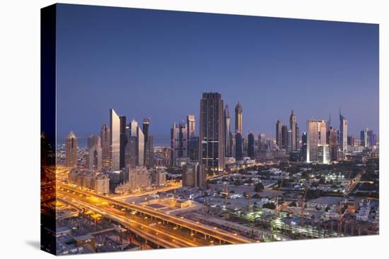 UAE, Downtown Dubai. Skyscrapers on Sheikh Zayed Road from downtown-Walter Bibikow-Premier Image Canvas