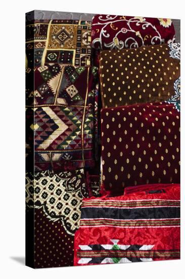 UAE, Dubai, Deira. Souvenir fabric-Walter Bibikow-Premier Image Canvas