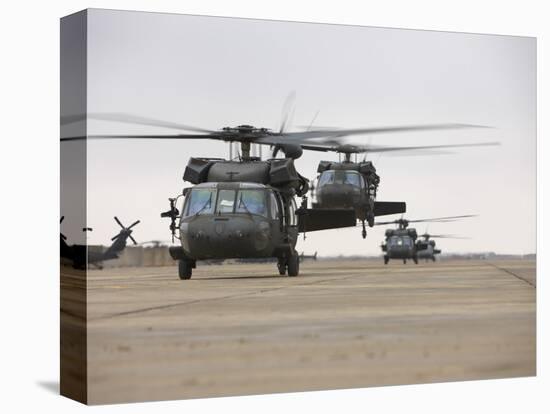 UH-60 Black Hawks Taxis Out for a Mission over Northern Iraq-null-Premier Image Canvas