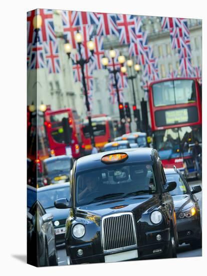 UK, England, London, Regent Street, Taxis and Union Jack Flags-Alan Copson-Premier Image Canvas