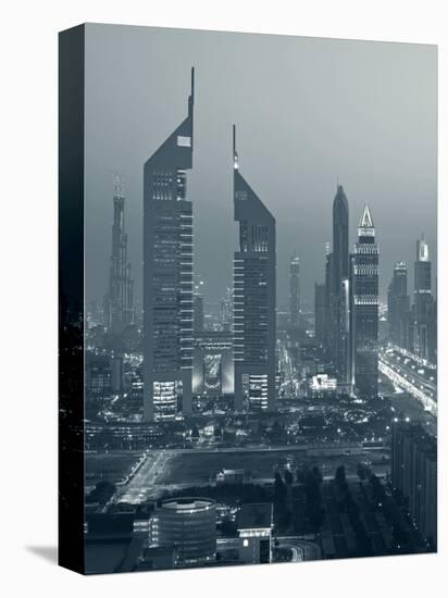 United Arab Emirates, Dubai, Sheik Zayed Road, Emirates Towers-Walter Bibikow-Premier Image Canvas