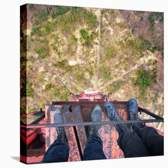 Urban Explorers Standing at the Top of Abandoned Tower in Army Boots-Aleksey Stemmer-Stretched Canvas
