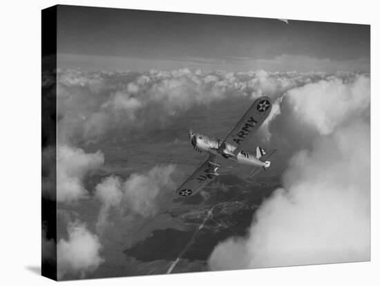 US Army's Ryan, Dragonfly, YO-51 Observation Plane Soaring Above the Clouds-Peter Stackpole-Premier Image Canvas