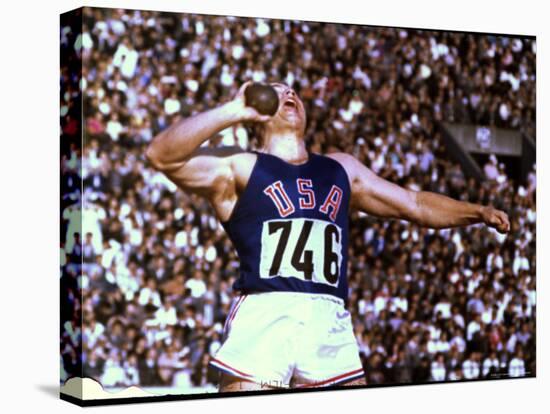 US Athlete in Action During the Shot Put at the Summer Olympics-John Dominis-Premier Image Canvas