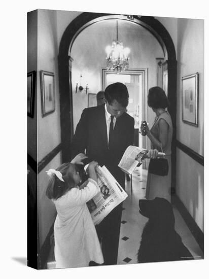 US Attorney General Bobby Kennedy Browsing Copy of the NY Times with daughter and Wife-George Silk-Premier Image Canvas