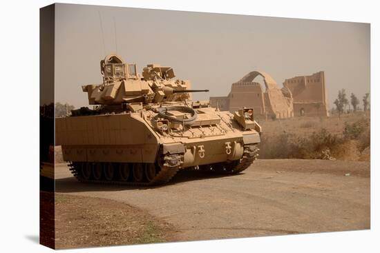 US Bradley Fighting Vehicle Passes by the Palace of Historic Ctesiphon, Feb. 16, 2008-null-Stretched Canvas