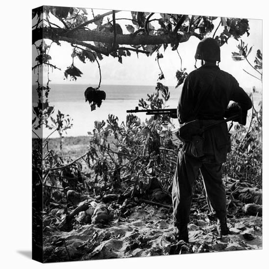 US Marine Looking at Bodies of Dead Japanese Soldiers Killed During Battle For Control of Saipan-W^ Eugene Smith-Premier Image Canvas