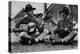 US Marine Sitting on Ground and Playing Guitar-null-Premier Image Canvas