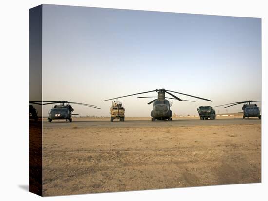 US Military Vehicles and Aircraft Lined Up on the Taxiway at Camp Speicher, Iraq-null-Premier Image Canvas