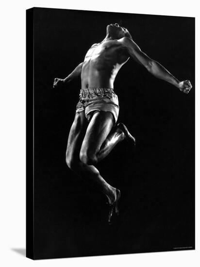 US Pentathlon Champion John Borican at the Peak of His Broad Jump-Gjon Mili-Premier Image Canvas