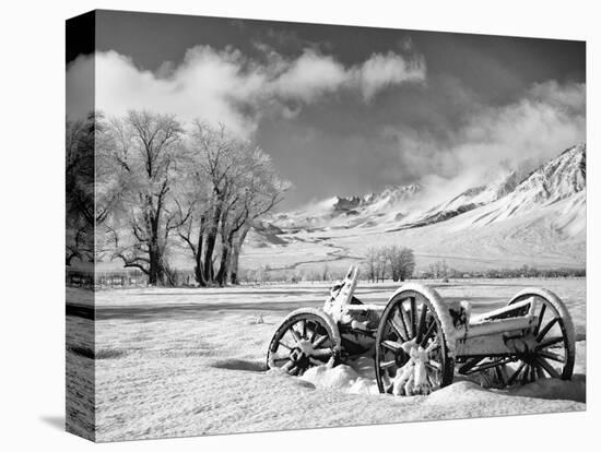 USA, California, Bishop. Snow-Covered Vintage Wagon in Owens Valley-Dennis Flaherty-Premier Image Canvas
