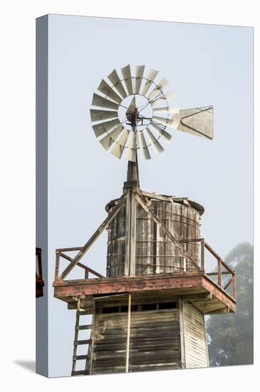 USA California. Cayucos, old wooden water tower with windmill for pumping-Alison Jones-Premier Image Canvas