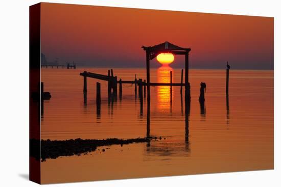 USA, Florida, Apalachicola, Sunrise at an old boat house at Apalachicola Bay.-Joanne Wells-Premier Image Canvas