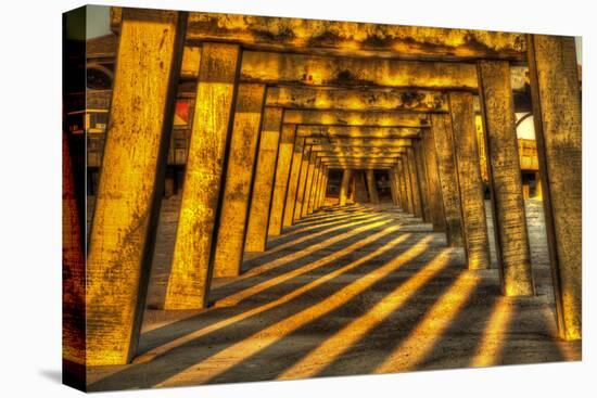 USA, Georgia, Tybee Island. Tybee Pier with shadows at sunrise.-Joanne Wells-Premier Image Canvas