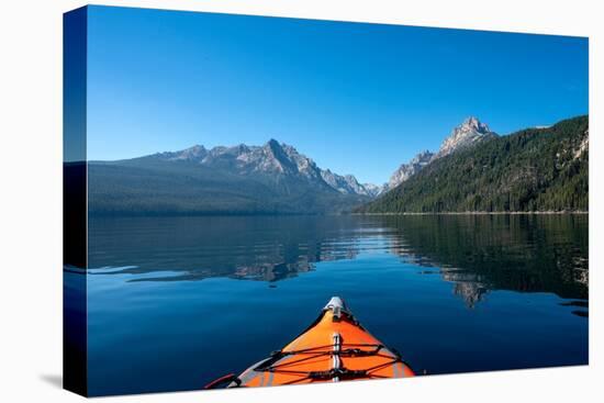 USA, Idaho, Redfish Lake. Kayak facing Sawtooth Mountains.-Janell Davidson-Premier Image Canvas