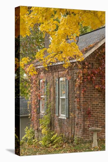 USA, Iowa, Mt Vernon. Brick House in Autumn-Don Grall-Premier Image Canvas