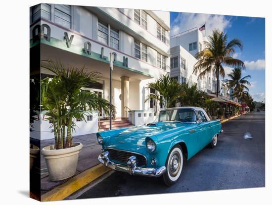 USA, Miami Beach, South Beach, Ocean Drive, Avalon Hotel and 1957 Thunderbird Car-Walter Bibikow-Premier Image Canvas
