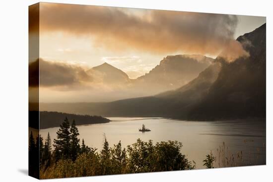 USA, Montana, Glacier NP. Sunrise pierces clouds over St. Mary Lake.-Don Grall-Premier Image Canvas