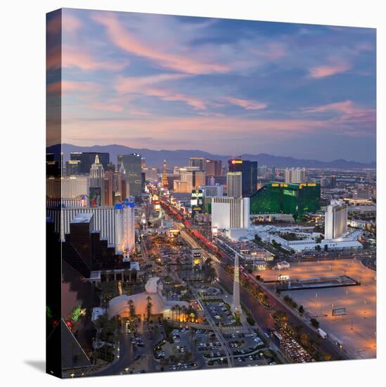 USA, Nevada, Las Vegas, Elevated Dusk View of the Hotels and Casinos Along the Strip-Gavin Hellier-Premier Image Canvas