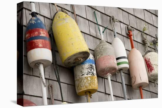 USA, Rhode Island, Block Island. Fishing buoys and floats on a wall.-Cindy Miller Hopkins-Premier Image Canvas