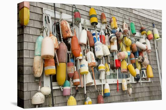 USA, Rhode Island, Block Island. Fishing buoys and floats on a wall.-Cindy Miller Hopkins-Premier Image Canvas