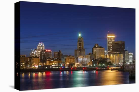 USA, Rhode Island, Providence, city skyline from the Providence River at dusk-Walter Bibikow-Premier Image Canvas