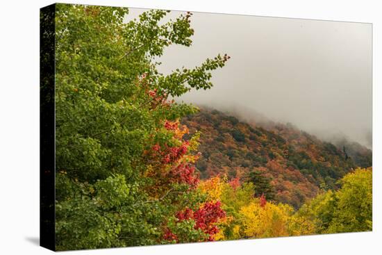 USA, Vermont, New England, Stowe Mt. Mansfield parking lot view with fog on mountains-Alison Jones-Premier Image Canvas