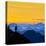 USA, Washington State. A backpacker descending from the Skyline Divide at sunset.-Gary Luhm-Premier Image Canvas