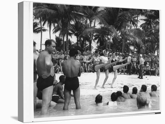 USO Chorus Girls Doing High-Kicks in Swimsuits During Impromptu Song and Dance on Beach-Peter Stackpole-Premier Image Canvas
