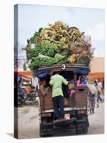 Van Loaded with Bananas on Its Roof Leaving the Market, Stone Town, Zanzibar, Tanzania-Yadid Levy-Premier Image Canvas