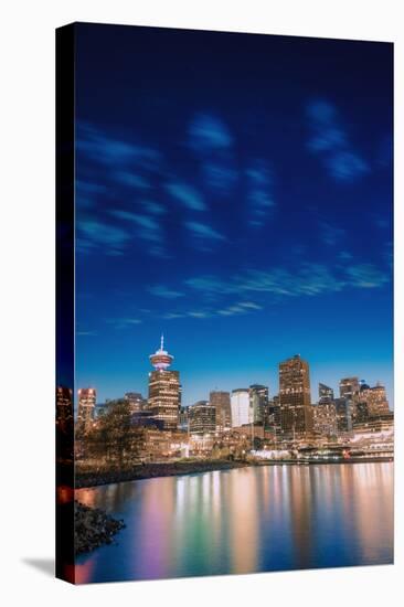 Vancouver skyline and high rise buildings at night, Vancouver, British Columbia, Canada, North Amer-Toms Auzins-Premier Image Canvas