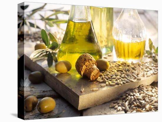 Various Oils in Carafes, Olives, Sunflower Seeds-Peter Rees-Premier Image Canvas