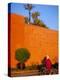 Veiled Woman Bicycling Below Red City Walls, Marrakech, Morocco-Merrill Images-Premier Image Canvas