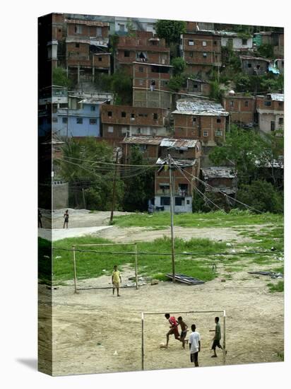 Venezuelan Children Play Soccer at the Resplandor Shantytown-null-Premier Image Canvas