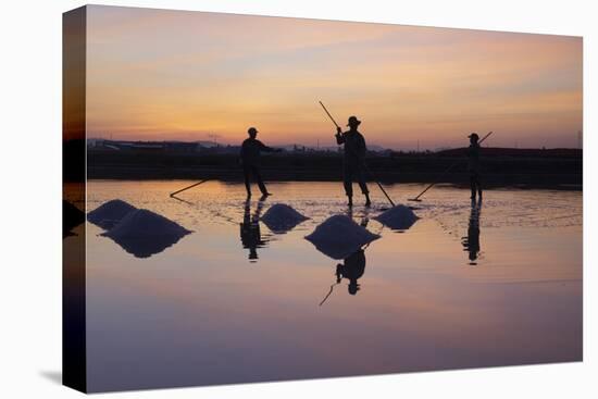 Vietnam. Doc Let Salt lake. Workers harvesting the salt. Early morning sunrise.-Tom Norring-Premier Image Canvas