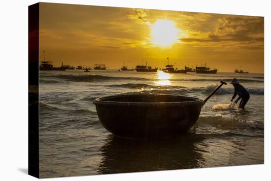 Vietnam. Fishermen deliver the nights catch to the beach at Hoi An.-Tom Norring-Premier Image Canvas