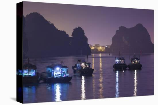 Vietnam, Halong City, Halong Bay Fishing Boats, Dusk-Walter Bibikow-Premier Image Canvas