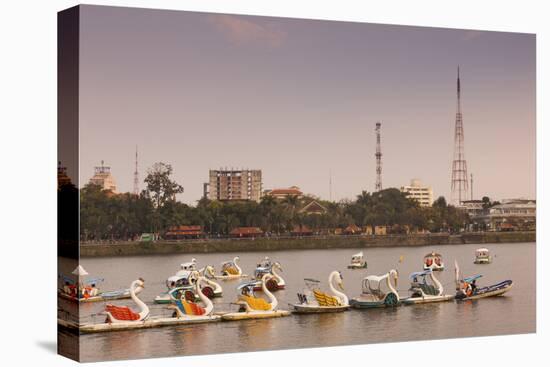Vietnam, Hue. Perfume River and Tourist Swan Boats, Sunset-Walter Bibikow-Premier Image Canvas