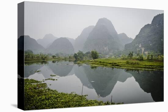 Vietnam, Ninh Binh. Limestone Karsts, with Reflection, in Fog-Matt Freedman-Premier Image Canvas