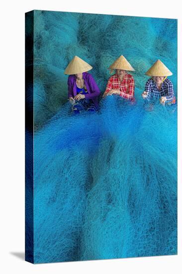 Vietnam. Women repairing fishing nets.-Tom Norring-Premier Image Canvas